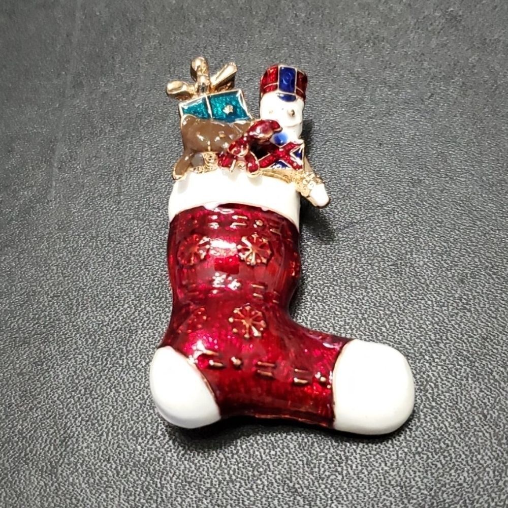 Monet gold tone red enamel stocking brooch